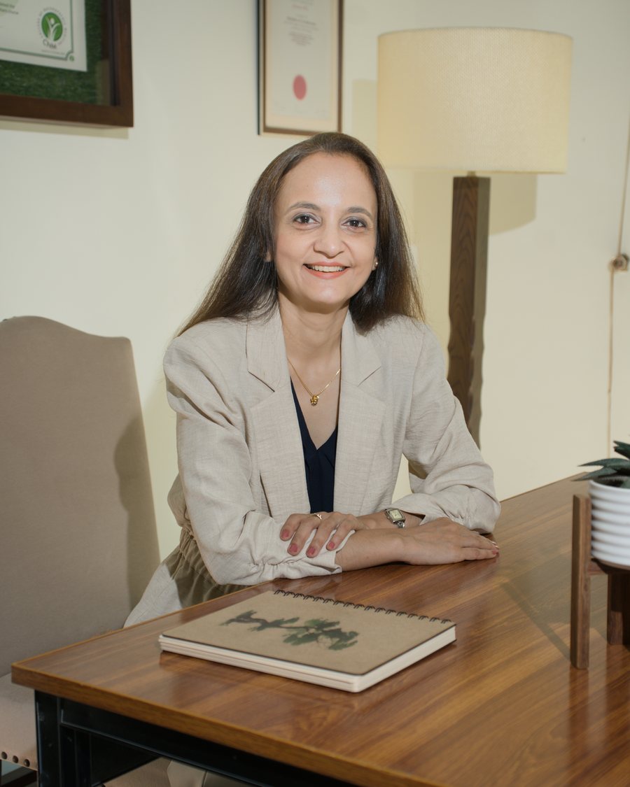 Samer Hashmi at her desk